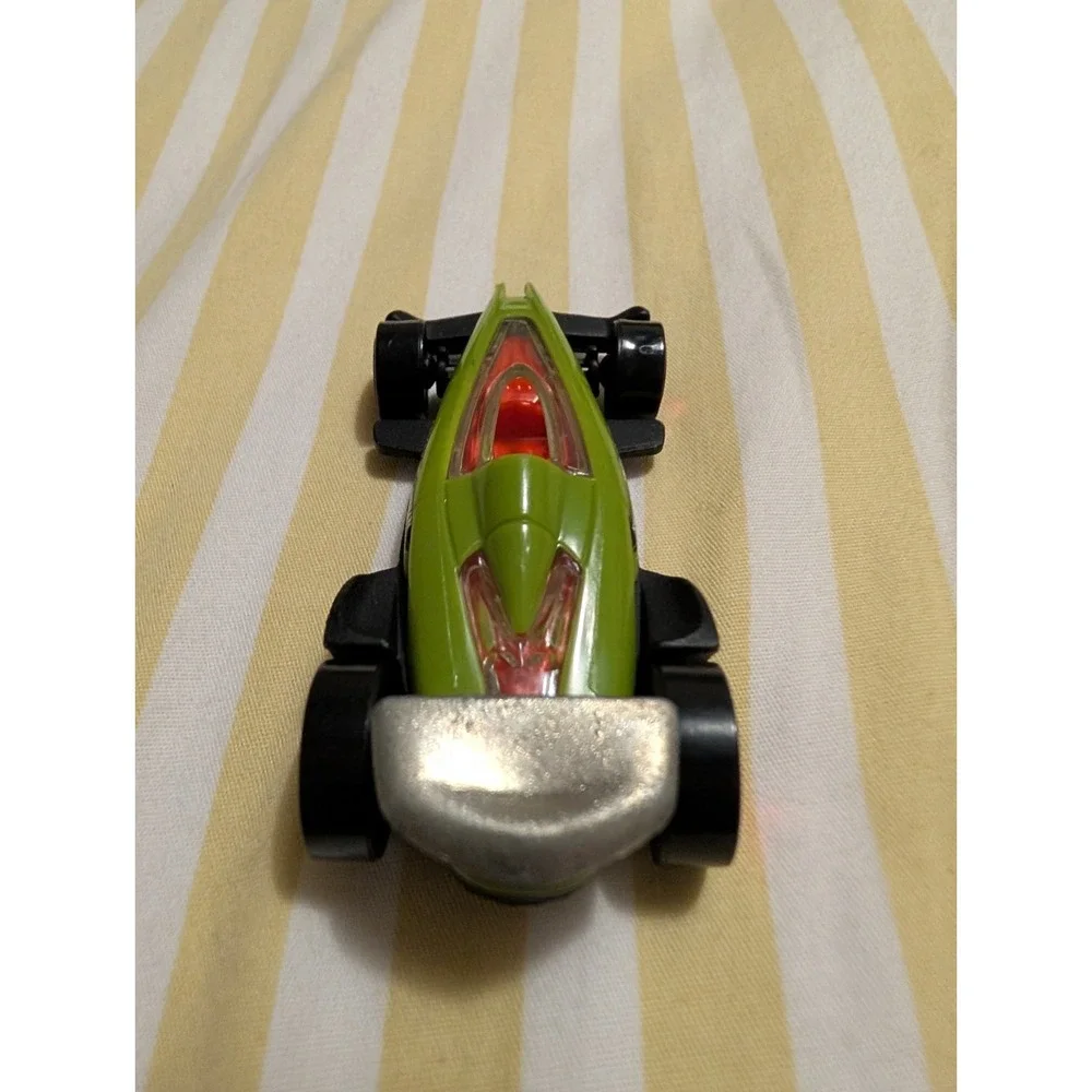Hot Wheels 2012 Green Carbide Stunt Team Racer 1:64 Diecast Car Thailand